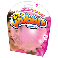 Packaging of a Tiny Wubble bubble ball with a child's face in the background