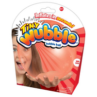 Packaging of Tiny Wubble bubble ball with a woman holding it, featuring the text 'Inflates in seconds!'.